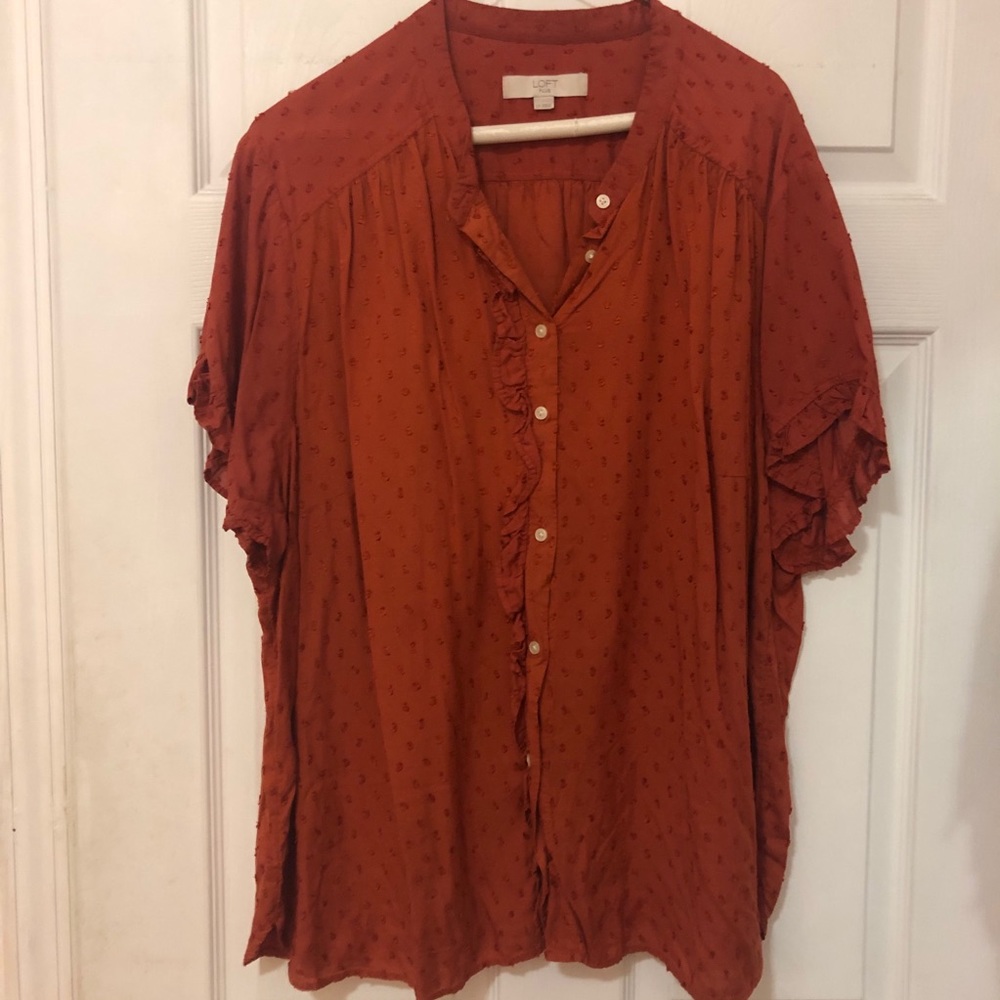 Orange ruffle top
